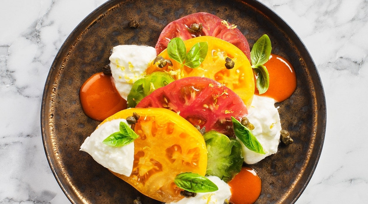 Heirloom Tomato Salad with Charred Capers and Tomato Dressing – - Recipe